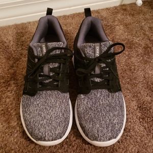Gray, black, and white sneakers